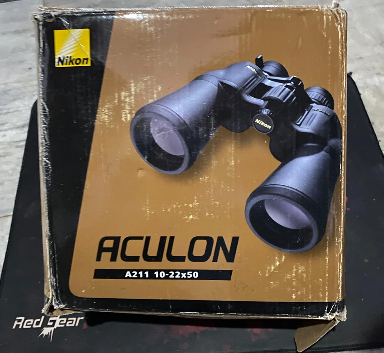Nikon ACULON A211 10-22x50 Binoculars Black in use