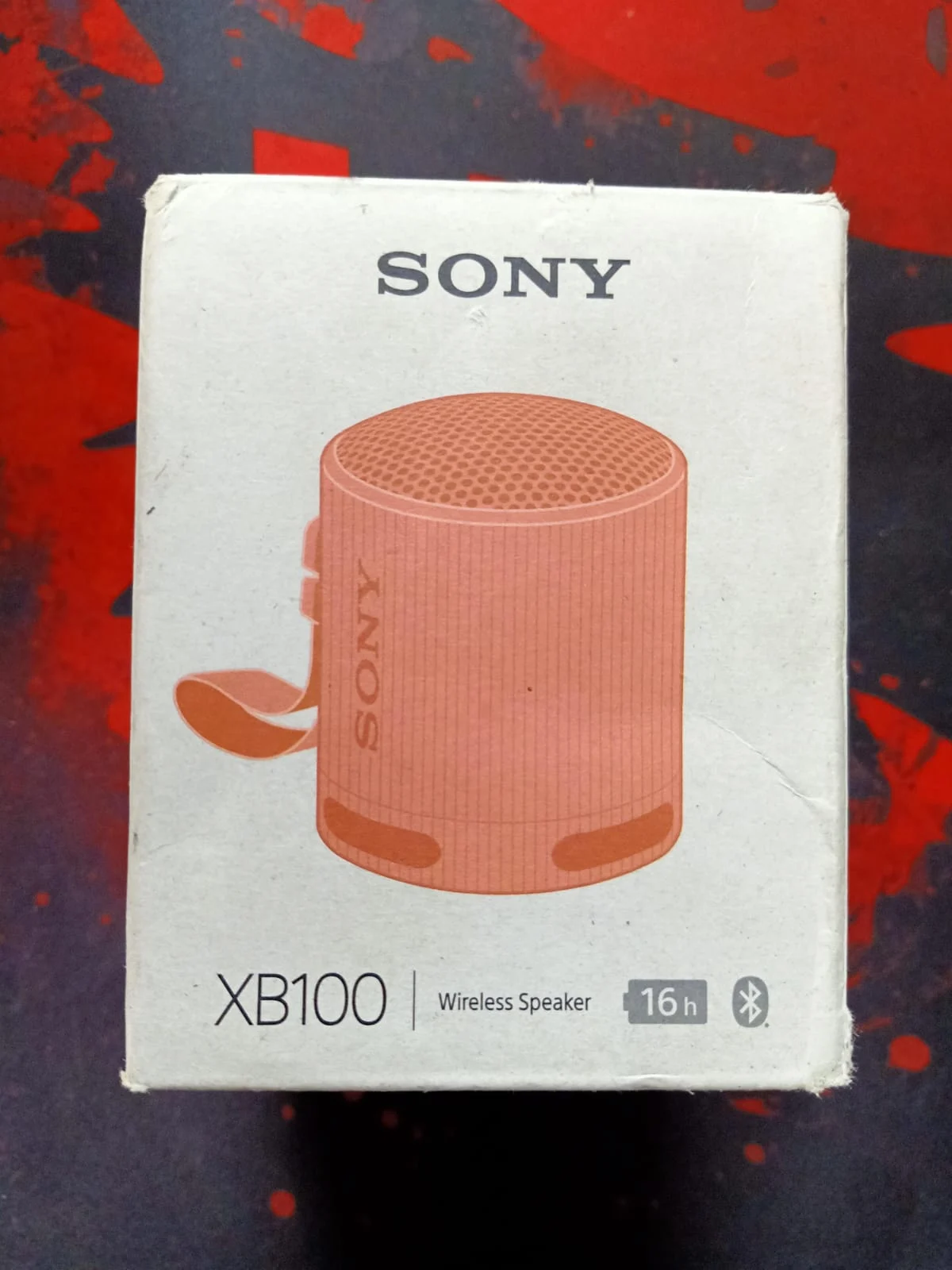 Sony SRS-XB100 Wireless Bluetooth Portable Speaker Orange in use