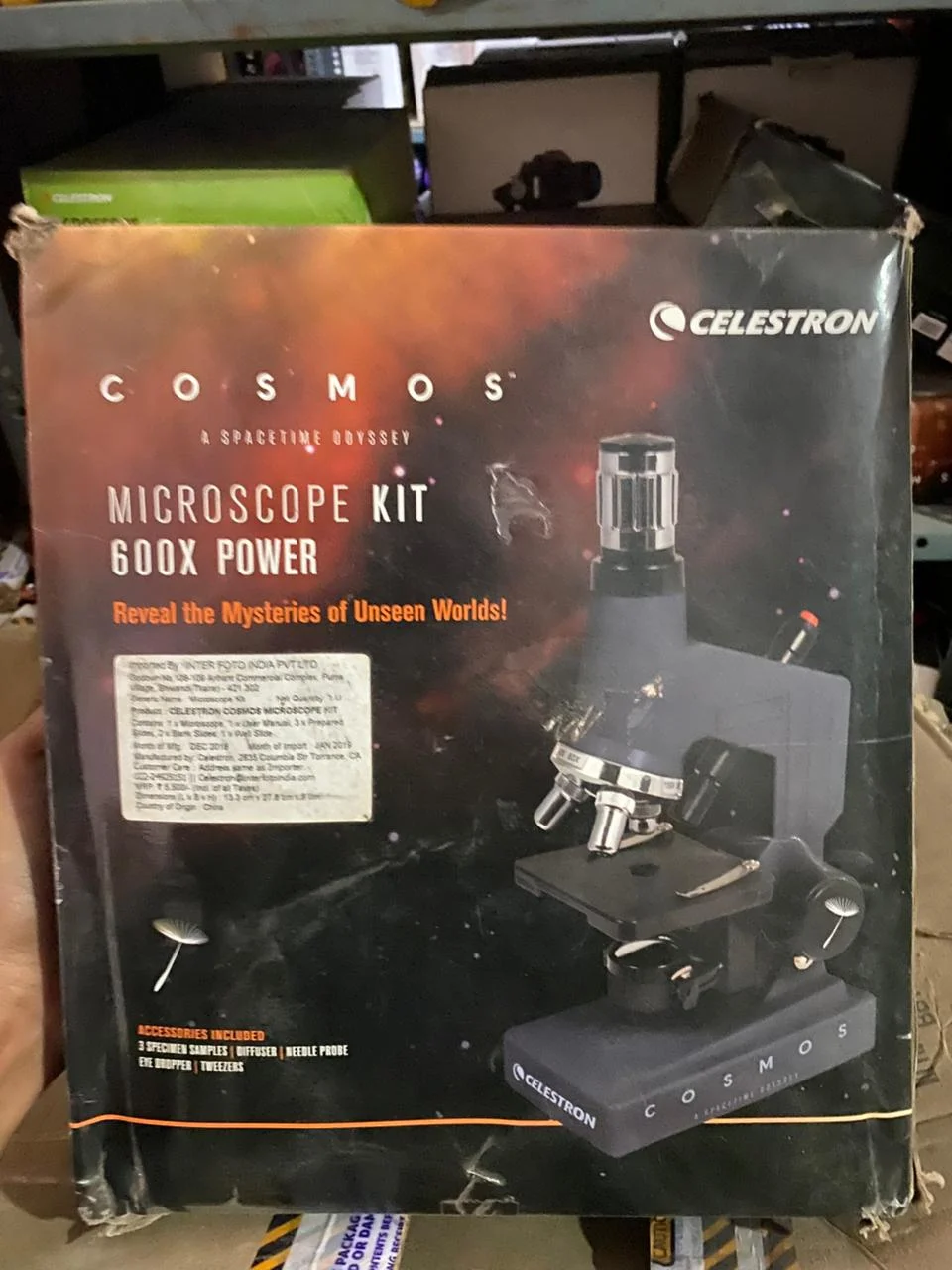 Celestron 44127 Cosmos Microscope Kit Black in use