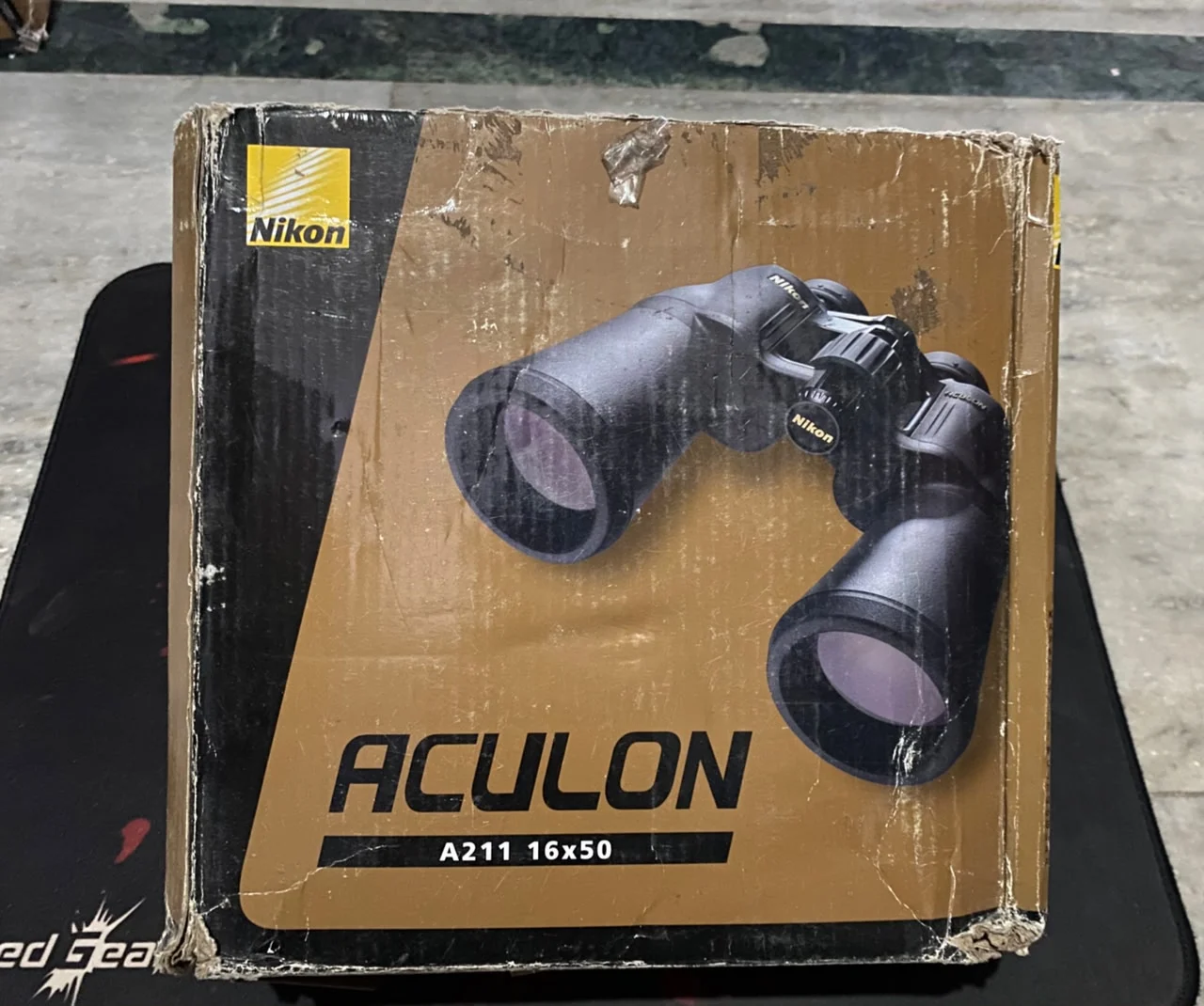 Nikon ACULON A211 16x50 Binocular (Black) in use