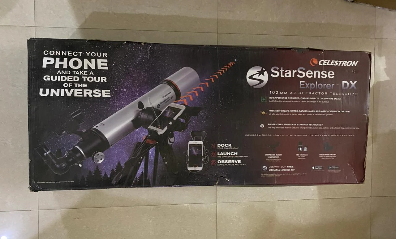 Celestron StarSense Explorer DX 102AZ refractor telescope in use