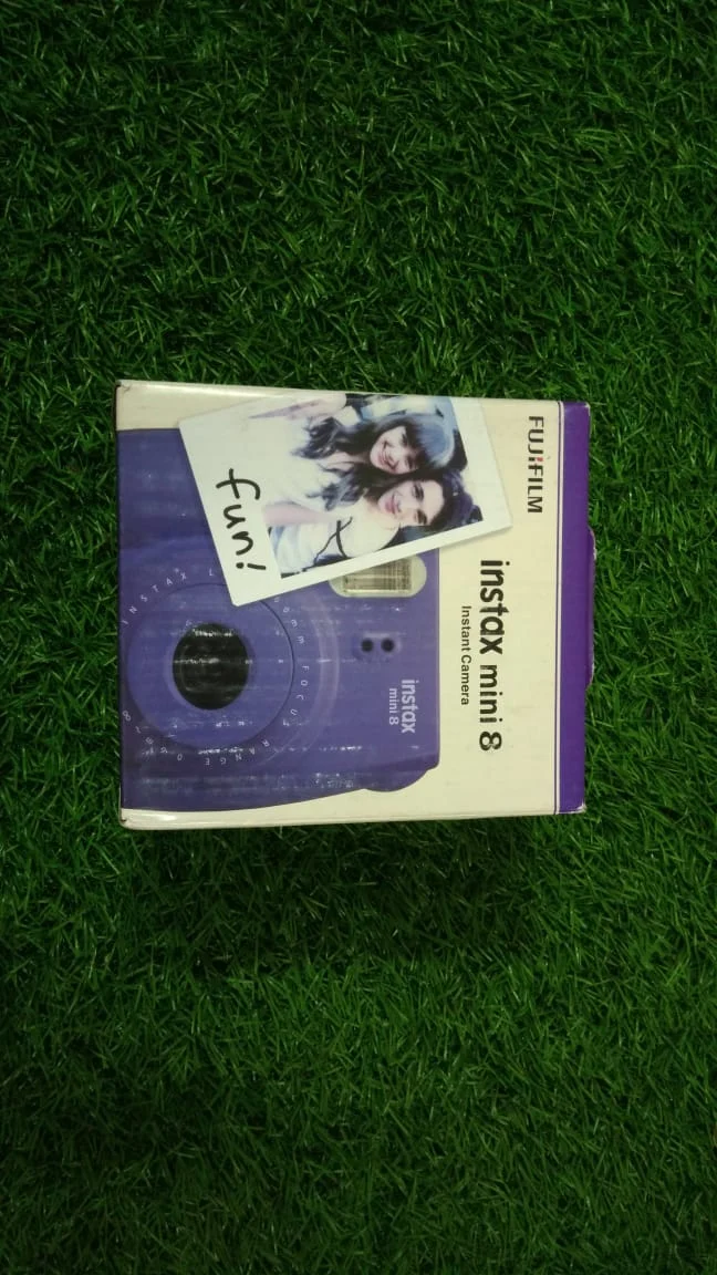 Fujifilm Instax Mini 8 Instant Film Camera in use