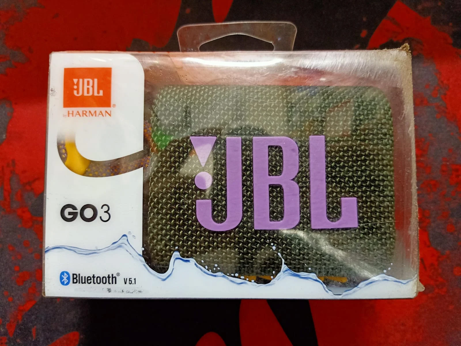JBL Go 3 Wireless Ultra Portable Bluetooth Speaker in use