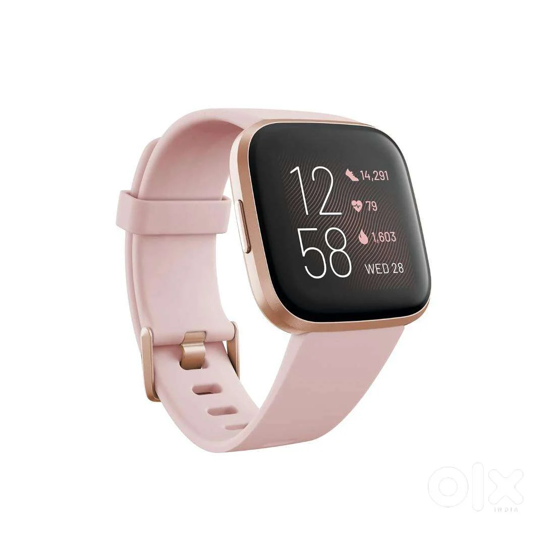 Fitbit Versa 2 Health & Fitness Smartwatch FB507RGPK in use